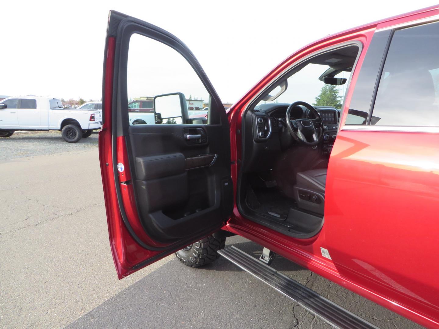 2021 MAROON /BLACK GMC Sierra 3500HD Denali (1GT49WEY1MF) with an Duramax 6.6L Turbo Diesel engine, 10 speed transmission, located at 2630 Grass Valley Highway, Auburn, CA, 95603, (530) 508-5100, 38.937893, -121.095482 - Duramax sitting on a BDS level kit with upper control arms and Fox shocks, 20" XD wheels, and 35" Nitto Ridge Grappler tires. - Photo#16